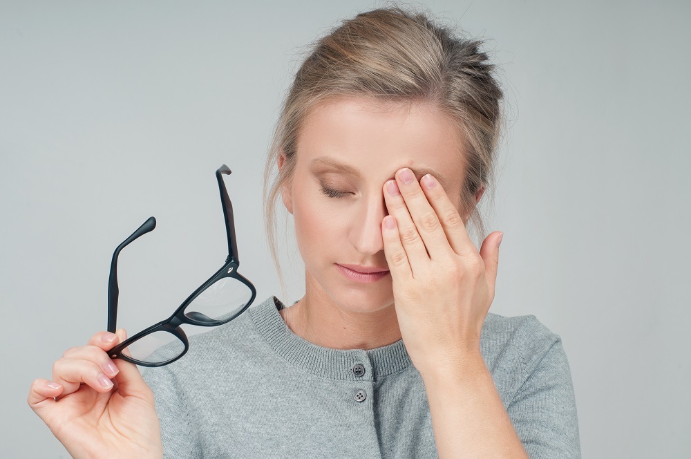 Tired Woman With Eyeglasses