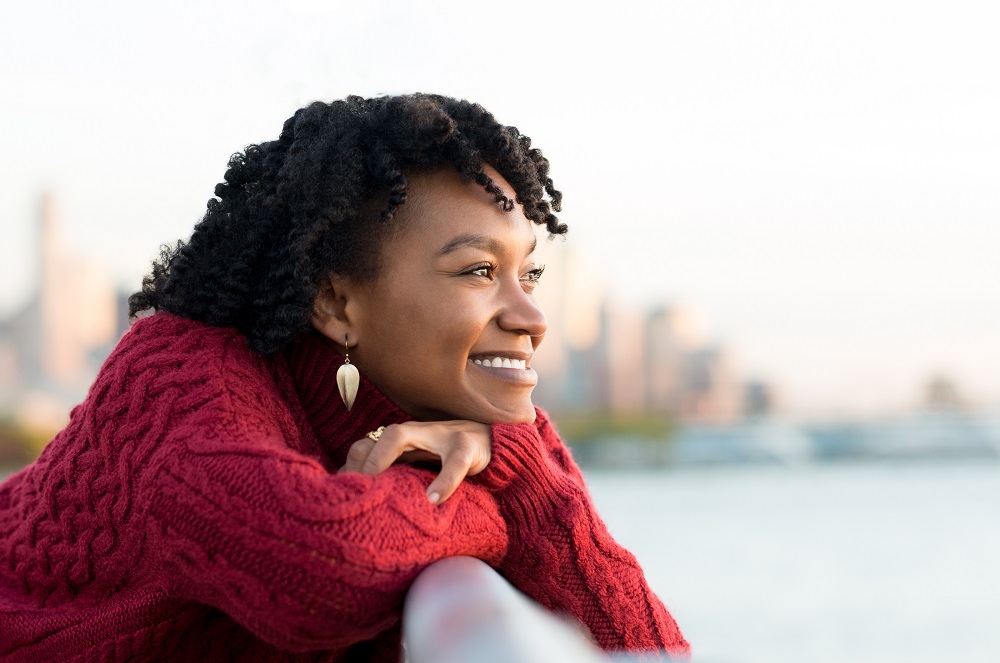 smiling woman looking off into the distance