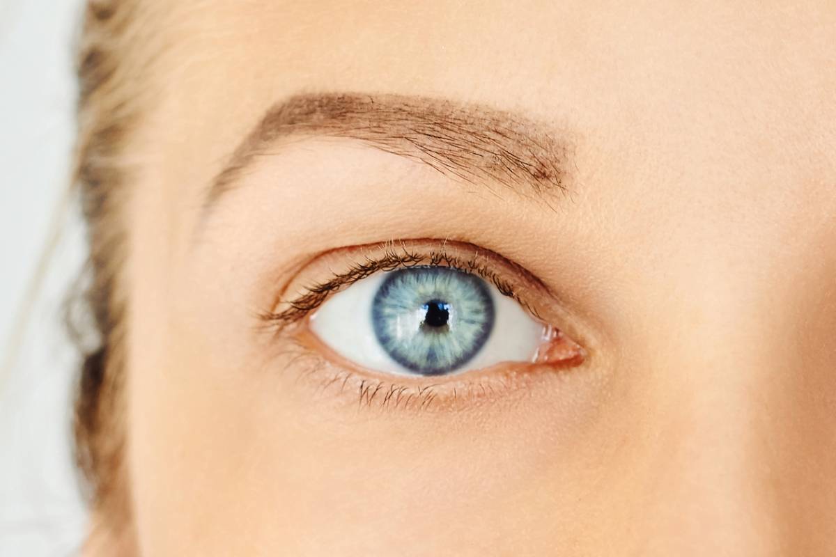 Close up of a woman with a beautiful eye color.